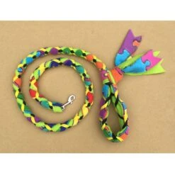 Hand Braided Dog Tug Leash With Clasp, Fleece And Paracord For Walking, Agility Or Flyball Jigsaw Puzzle Over Green With Yellow